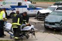 Paramedics and firefighters respond to an automobile injury accident in Boise, Idaho, USA.