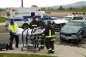 Paramedics and firefighters respond to an automobile injury accident in Boise, Idaho, USA.