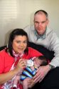 Caucasian father and hispanic mother with their infant son in Boise, Idaho, USA. MR