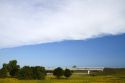 The leading edge of a cold front approaching blue sky in central Michigan, USA.