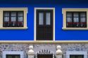 Residential housing with flowers in windows in the municipality of Cangas de Onis in Asturias, Spain.