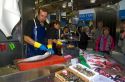 Seafood vendor at the Mercado de al Ribera along the Nervion River at Bilbao, Biscay, Spain.