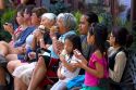 Tourists eat ice cream at Waterton Park townsite in Waterton Lakes National Park, Alberta, Canada.