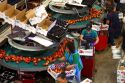 Workers sort peaches at the Symms Fruit Ranch packing facility near Sunny Slope, Idaho, USA.