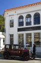 Vintage car parked in front of an art deco building at Napier in the Hawke's Bay Region, North Island, New Zealand.