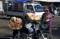 Street vendor selling roses in Da Lat, Vietnam.