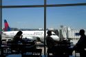 People eating at the food court area of the Denver International Airport, located in Denver, Colorado, USA.