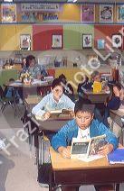 Children reading in an Elementary school classroom.  MR