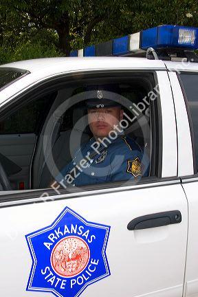 Arkansas State Police trooper and car in Ozark, Arkansas.
arkansas, arkansas state police, police, police officer, officer, cop, law enforcement, police car, ozark, uniform