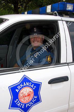 Arkansas State Police trooper and car in Ozark, Arkansas.
arkansas, arkansas state police, police, police officer, officer, cop, law enforcement, police car, ozark, uniform, smile