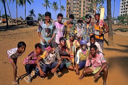 Indians at Mumbai Bombay display their Holi Festival colors splashed on their faces in India.