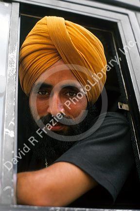 Bus driver at Agra, India.