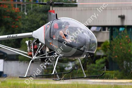 An experimental helicopter with student pilot in Sao Paulo, Brazil.
