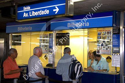 People buying tickets at a subway station in Sao Paulo, Brazil.