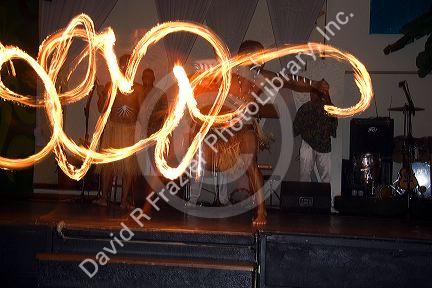 A man dances with fire at a nightclub in Sao Paulo, Brazil.