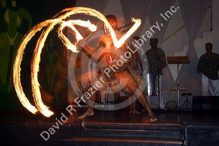 A man dances with fire at a nightclub in Sao Paulo, Brazil.