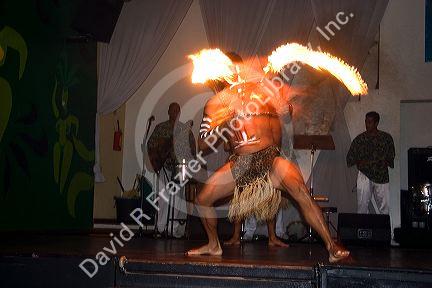 A man dances with fire at a nightclub in Sao Paulo, Brazil.