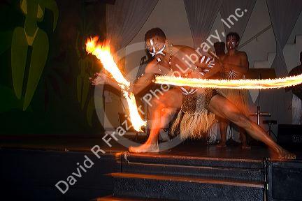 A man dances with fire at a nightclub in Sao Paulo, Brazil.
