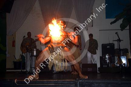 A man dances with fire at a nightclub in Sao Paulo, Brazil.
