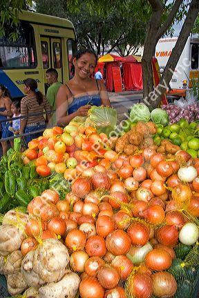 Street vendor selling produce in Manaus, Brazil.