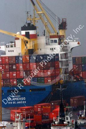 Container ship in the rain at the port in Manaus, Brazil.