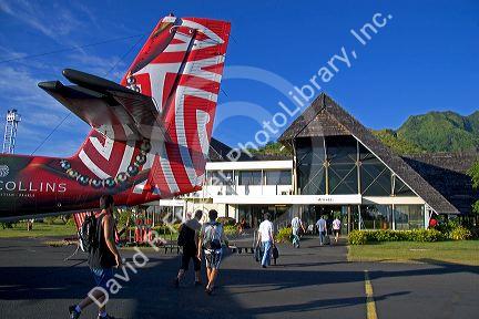 Airplane tail and the airport on the island of Moorea.