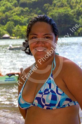 Tahitian woman wearing a bikini on the island of Moorea.