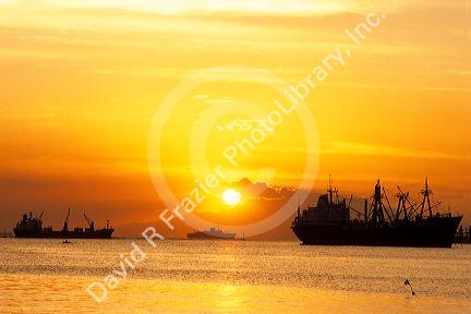 Ships at sunset in Manila Bay, Philippines.