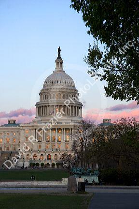 The United States Capitol Building in Washington, D.C. at dusk.