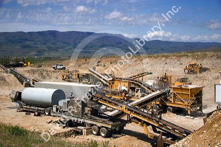 Rock crusher with conveyor belts at a gravel pit near Emmett, Idaho.