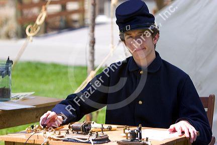 Reenactor using morse code at a civil war reenactment near Boise, Idaho.