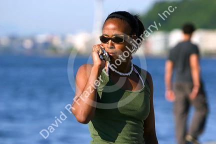 African american woman speaking on a cell phone in Seattle, Washington. MR