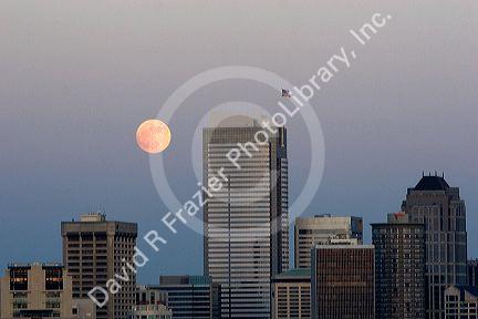 Full moon over the city of Seattle, Washington and the Two Union Square Building.