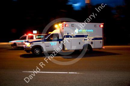 Ada County paramedics ambulance with flashing lights in Boise, Idaho.