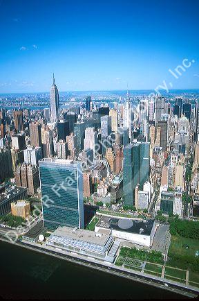 A aerial view of New York City showing the U.N. and Empire State Building.
