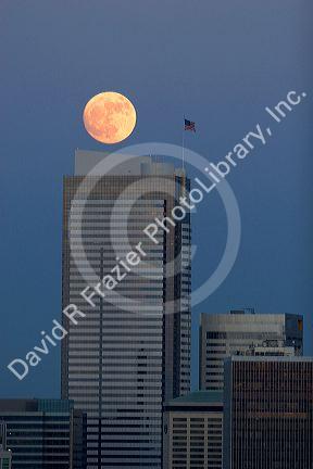 Full moon over the city of Seattle, Washington and the Two Union Square Building.