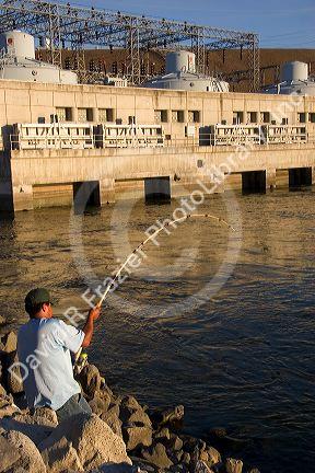 Man fishing for sturgeon at C.J. Strike Reservior on the Snake River in Idaho.