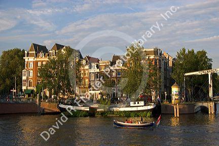 Boating on the Amstel River in Amsterdam, Netherlands.