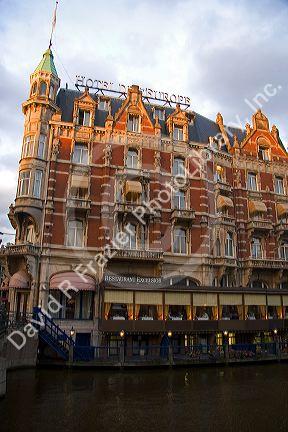 Hotel de L'Europe along the Amstel River in Amsterdam, Netherlands.