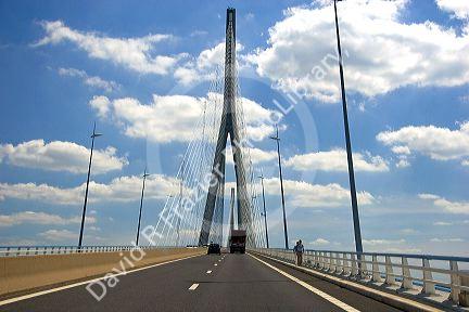 The Pont de Normandie (Bridge of Normandy) is a cable-stayed suspension bridge that crosses the river Seine linking Le Havre to Honfleur, Normandy, France.