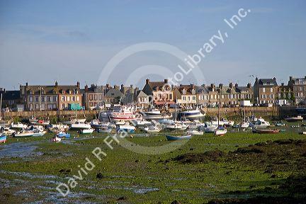 Low tide in the harbor at the village of Barfleur in the region of Basse-Normandie, France.