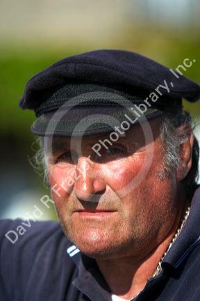 French fisherman in the village of Barfleur in the region of Basse-Normandie, France.