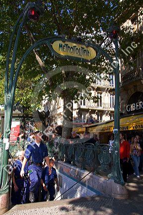 R.A.T.P. officers at the entrance to the Metro in Paris, France.
