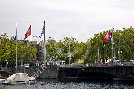 Quabrucke Bridge in Zurich, Switzerland.

switzerland, swiss, europe, european, travel, tourism, swiss alps, alps, alpine, zurich, river, boats, swiss flag, quabrucke bridge, limmat river