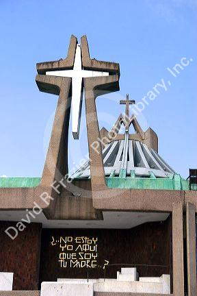 A cross at the entrance to the modern Basilica of Guadalupe in Mexico City, Mexico.