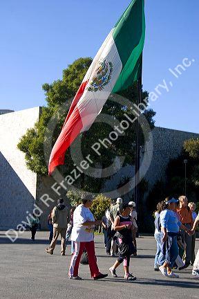 The National Flag of Mexico at the front entrance of the National Museum of Anthropology located within Chapultepec Park in Mexico City, Mexico.