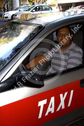 Taxi driver in Mexico City, Mexico.