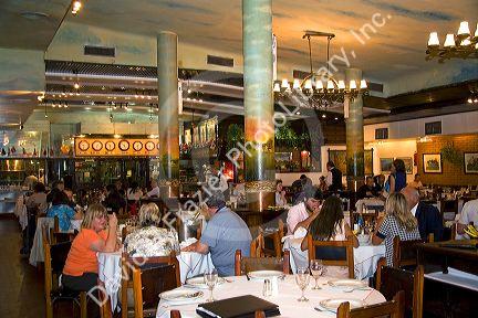 People dine at a restaurant in Buenos Aires, Argentina.