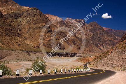 Highway along the Mendoza River in the Andes Mountain Range west of Upsallata, Argentina.