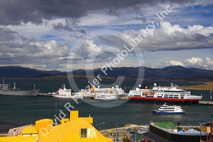 Ships docked in the bay at Ushuaia on the island of Tierra del Fuego, Argentina.
